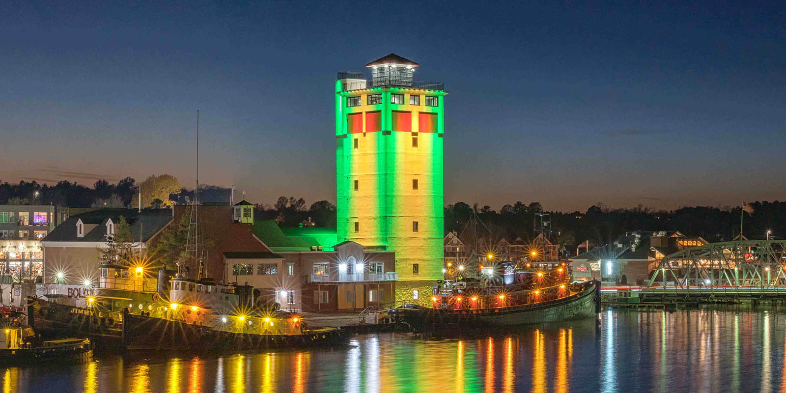 The 11 story tower with Green and Yellow color-changing LED lights at the Door County Maritime Museum in Sturgeon Bay, WI