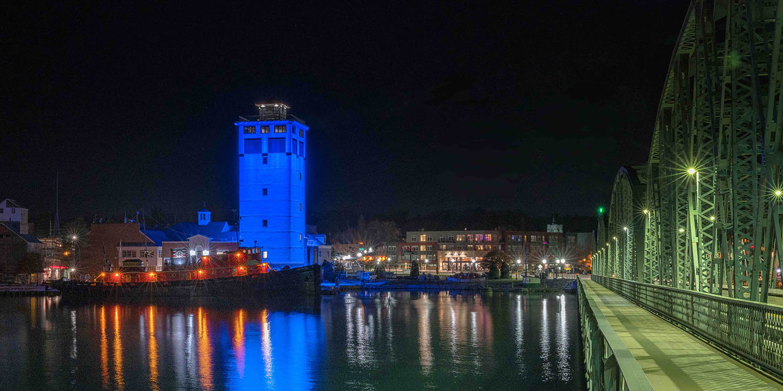 The 11 story tower with blue color-changing LED lights at the Door County Maritime Museum in Sturgeon Bay, WI