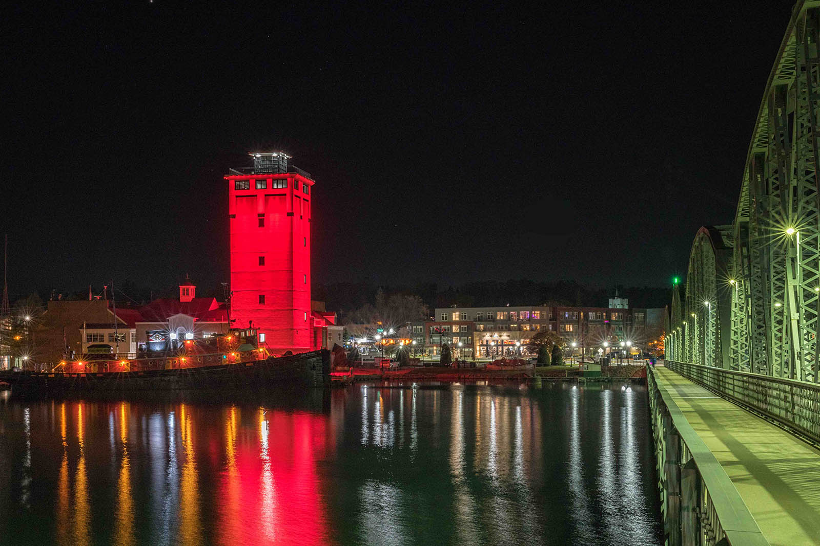 The 11 story tower with Red color-changing LED lights at the Door County Maritime Museum in Sturgeon Bay, WI