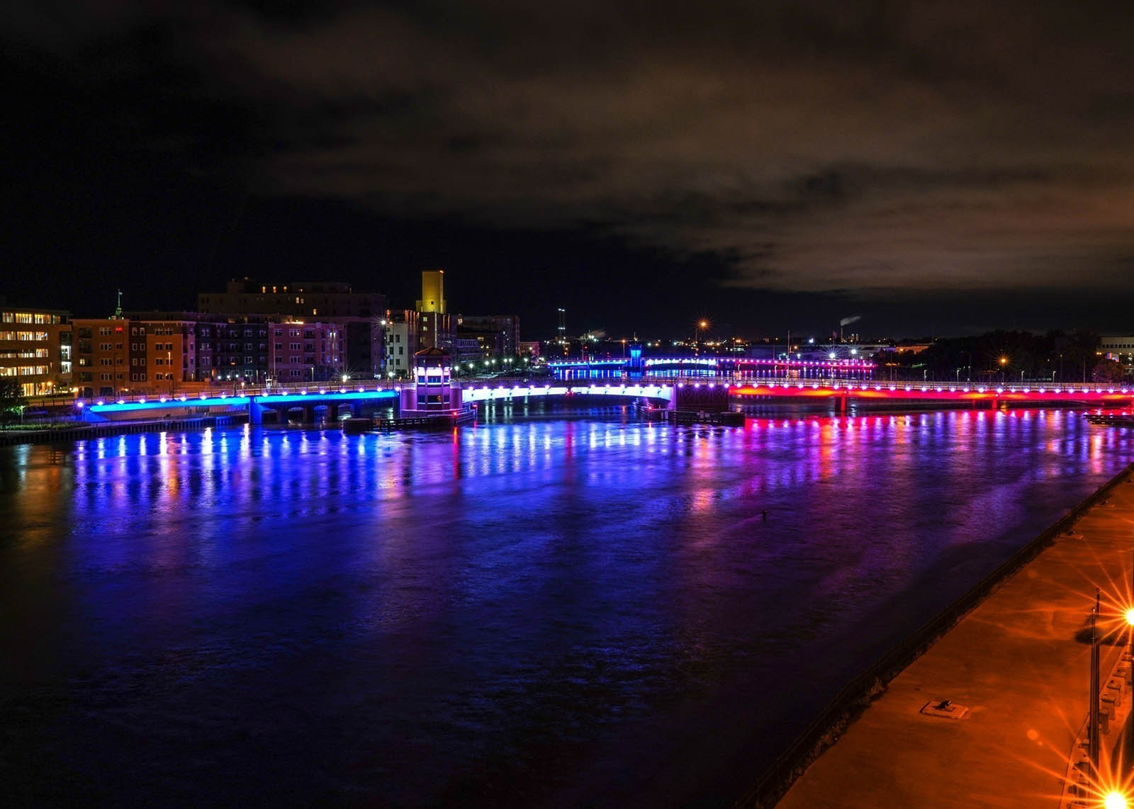 Red, white, and blue LED lighting patterns on the Ray Nitschke (Main St.) and Walnut Street bridges in Green Bay, WI