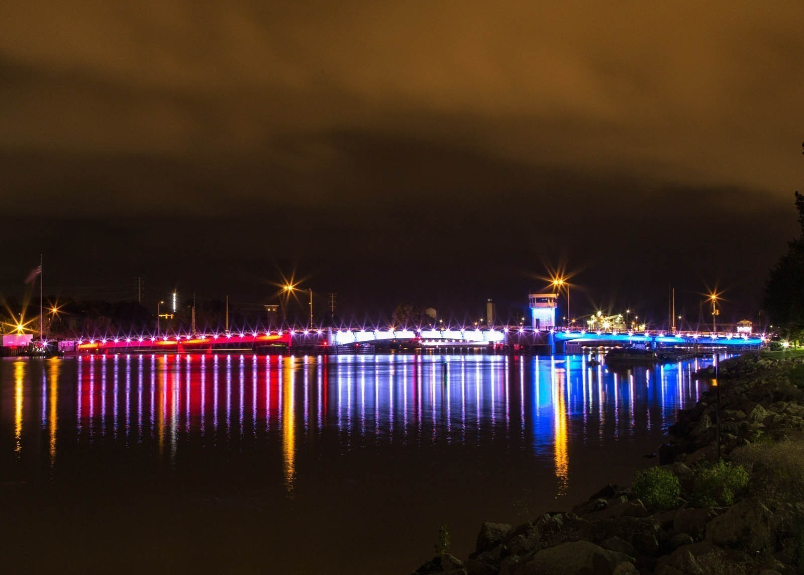 Red, white, and blue LED lighting patterns on the Walnut Street bridge in Green Bay, WI