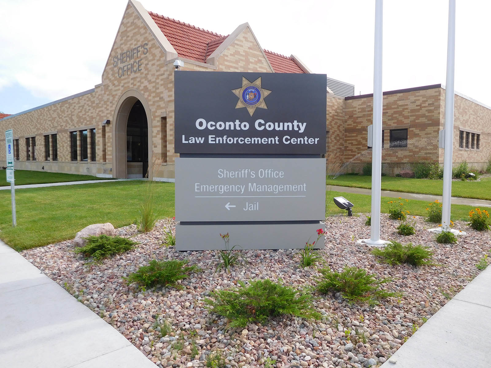 Signage and and main entrance at the Oconto County Law Enforcement Center in Oconto, WI